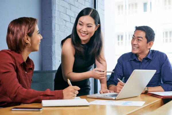 A group of people discussing on SEO